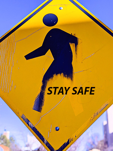 Stay Safe yellow sign